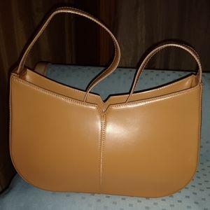 Asia Bellucci tan leather shoulder bag.